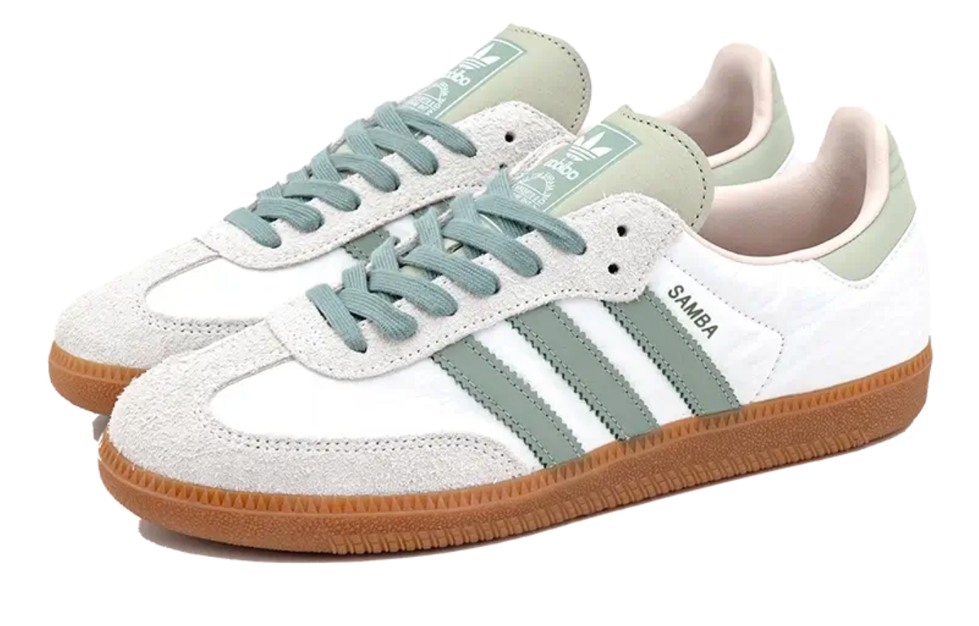 Scarpe da ginnastica bianche e verdi collezione Adidas