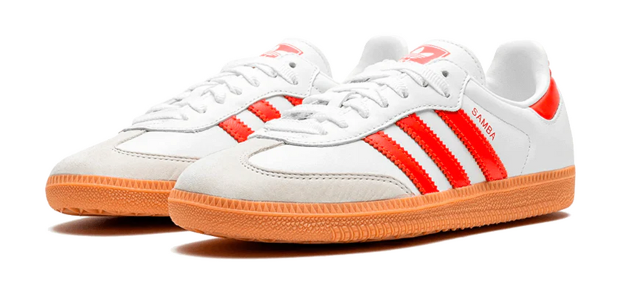 Scarpe da ginnastica bianche e rosse collezione Adidas