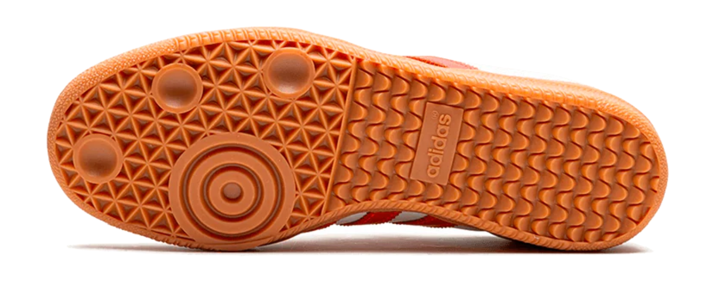 Scarpe da ginnastica bianche e rosse collezione Adidas