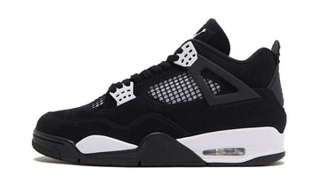 Scarpe da ginnastica nere e bianche collezione air jordan 4