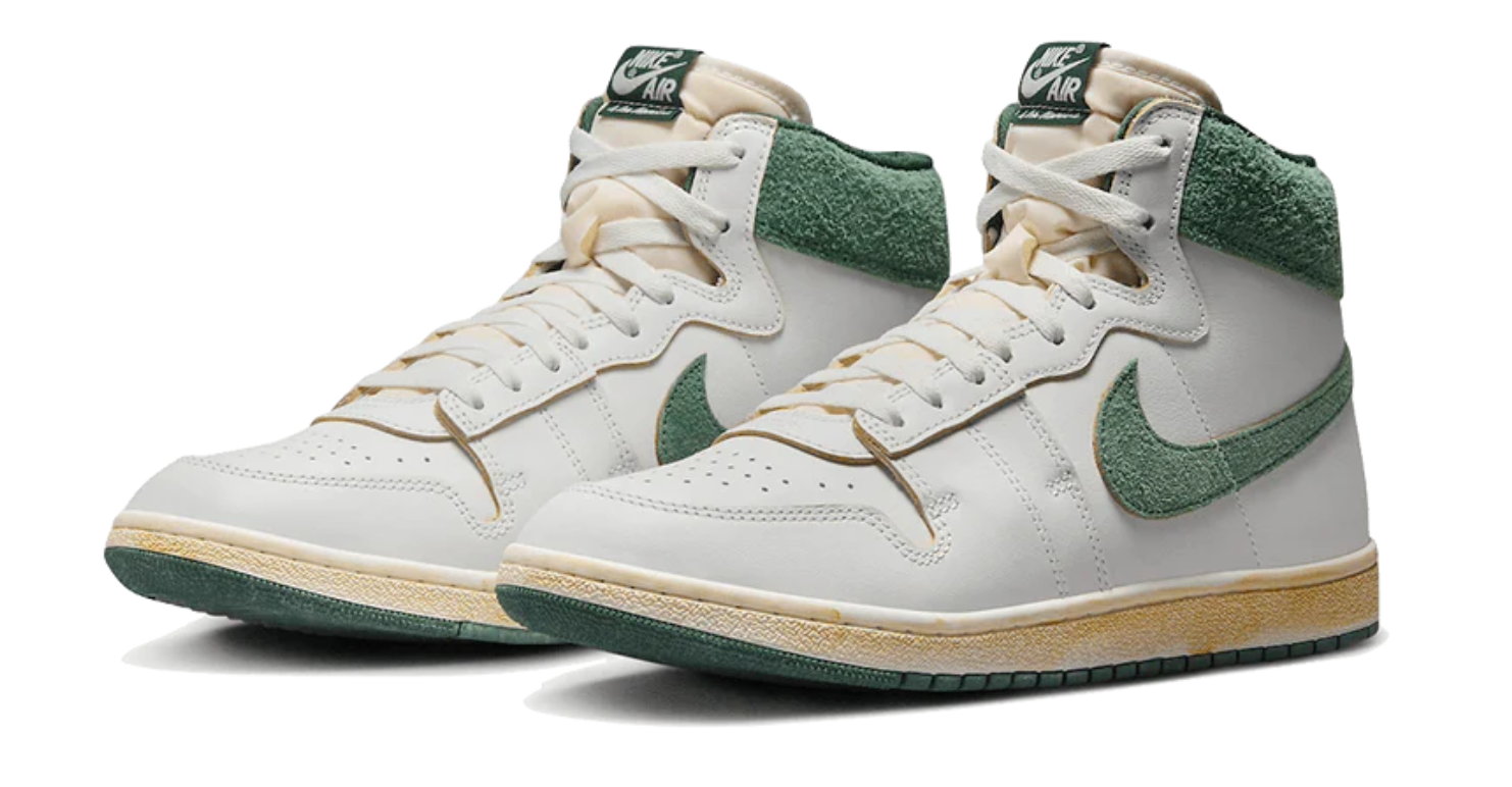 Scarpe da ginnastica bianche e verdi collezione nike