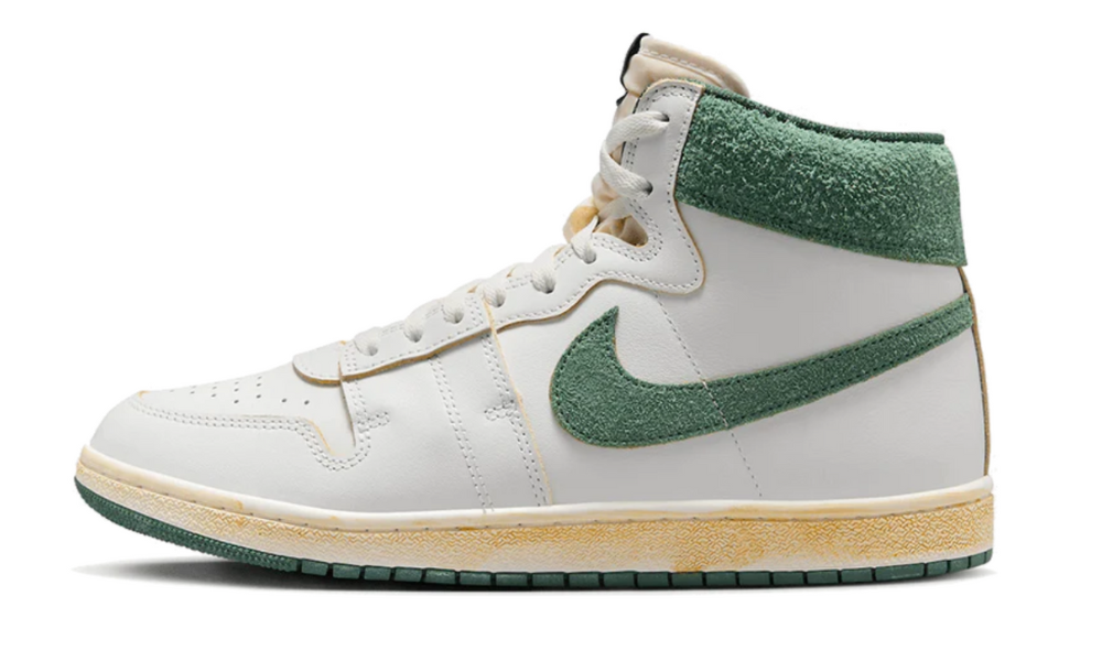 Scarpe da ginnastica bianche e verdi collezione nike